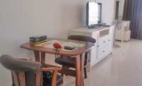 Beachfront condominium for rent in Pattaya with Flat screen TV and working desk.